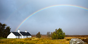 Rainbow and cottage